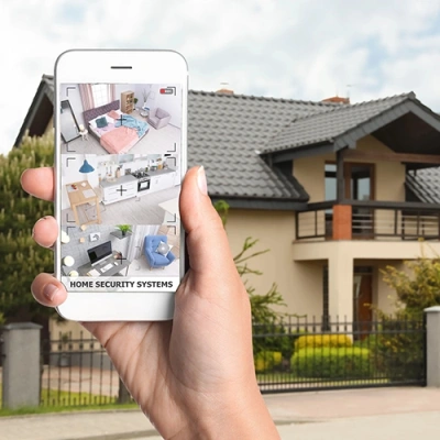 Savannah vivint phone display of cctv live feed in front of a house